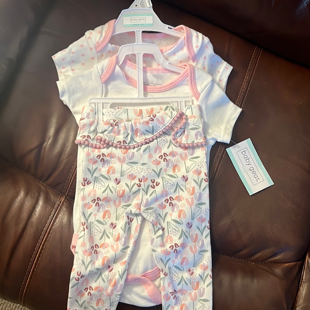 6-9m baby girl onesie set. 3 pieces included $10. NWT!
